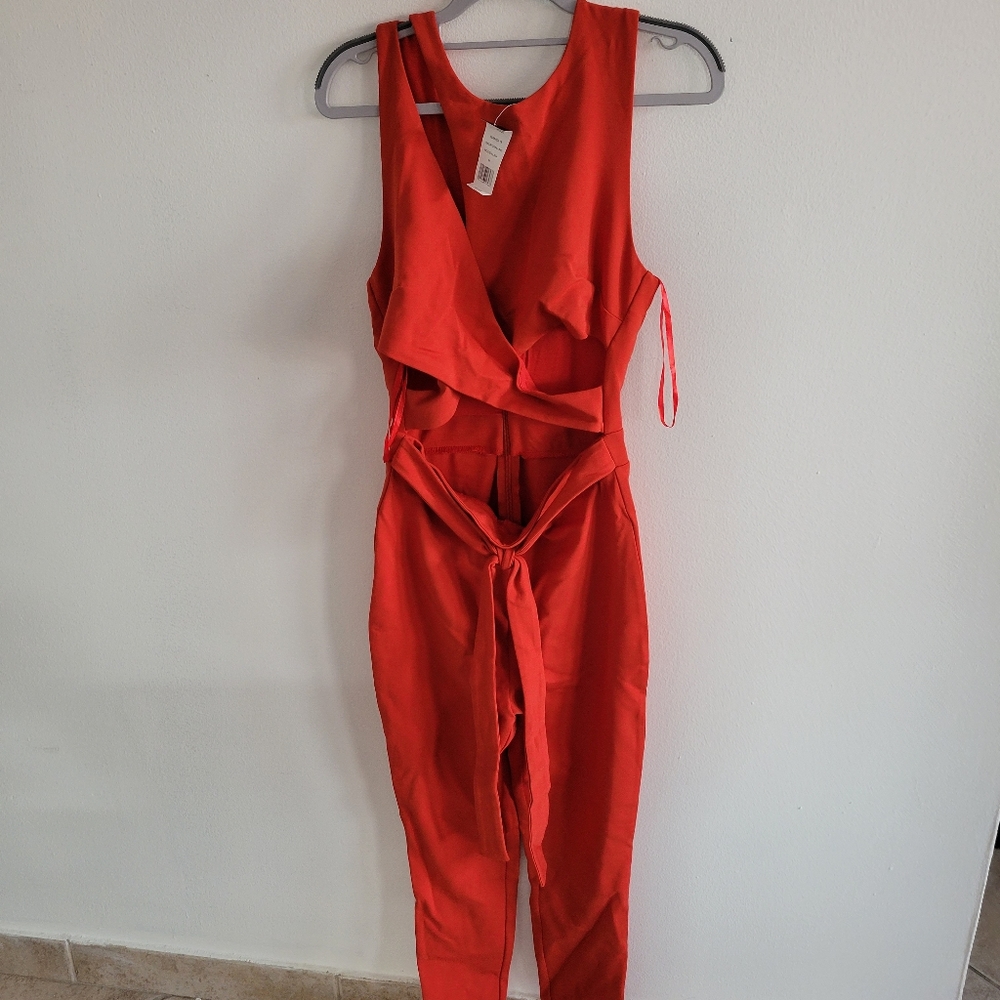 Red jumpsuit.
